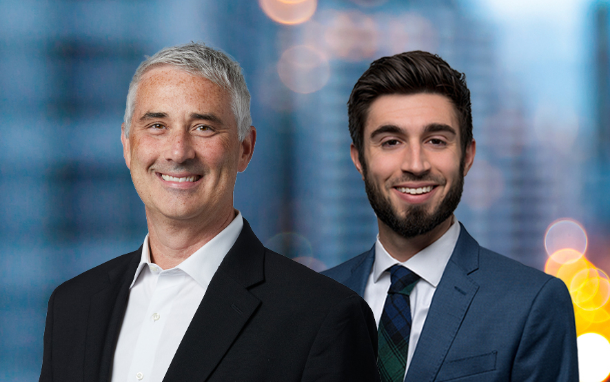 Mike Antonelli and Ross Mayfield in front of a cityscape