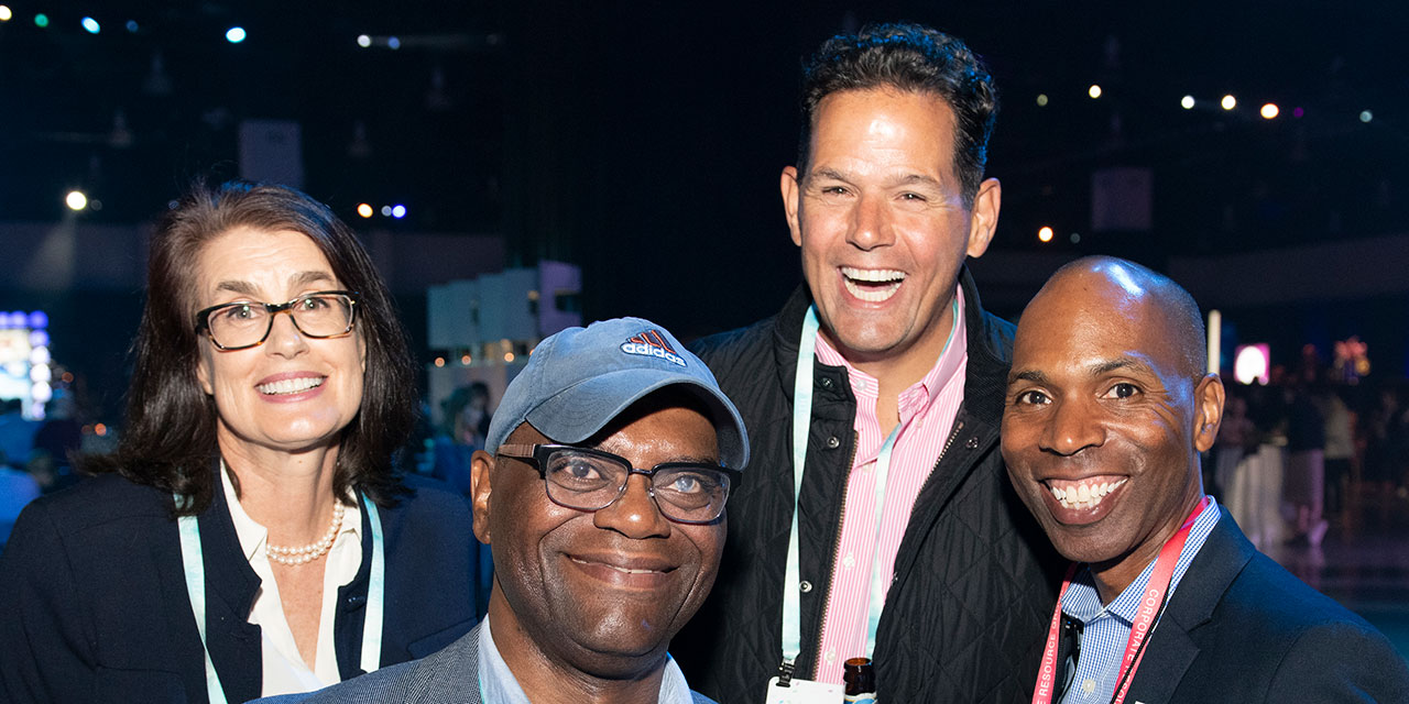 Four Silver LakeAssociates posting together at Silver Lakeevent.