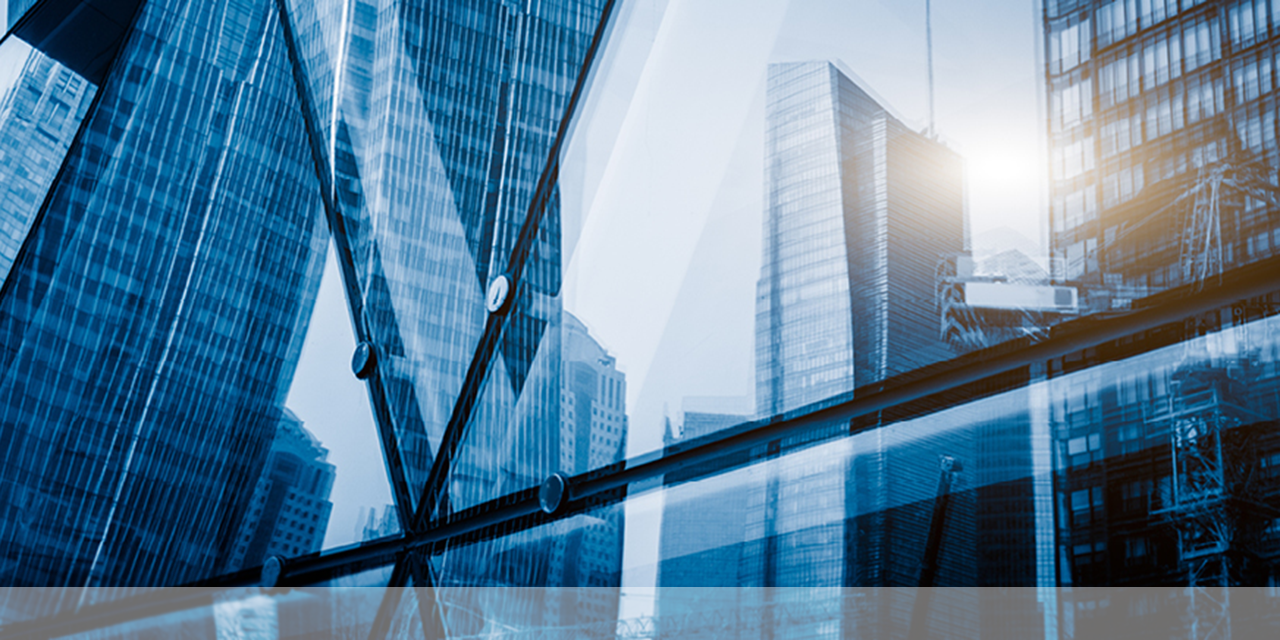 Abstract image of windows reflecting high rise building